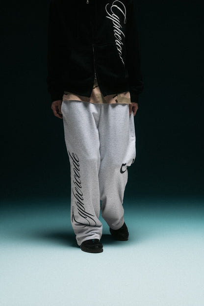 SCRIPT BAGGY SWEAT PANTS